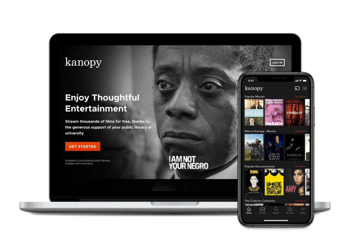 A laptop and smartphone display the Kanopy streaming service, featuring the documentary "I Am Not Your Negro" and a selection of films and documentaries on the app interface.